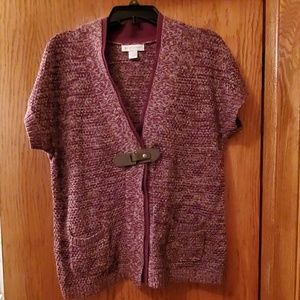 Sweater with buckle in front